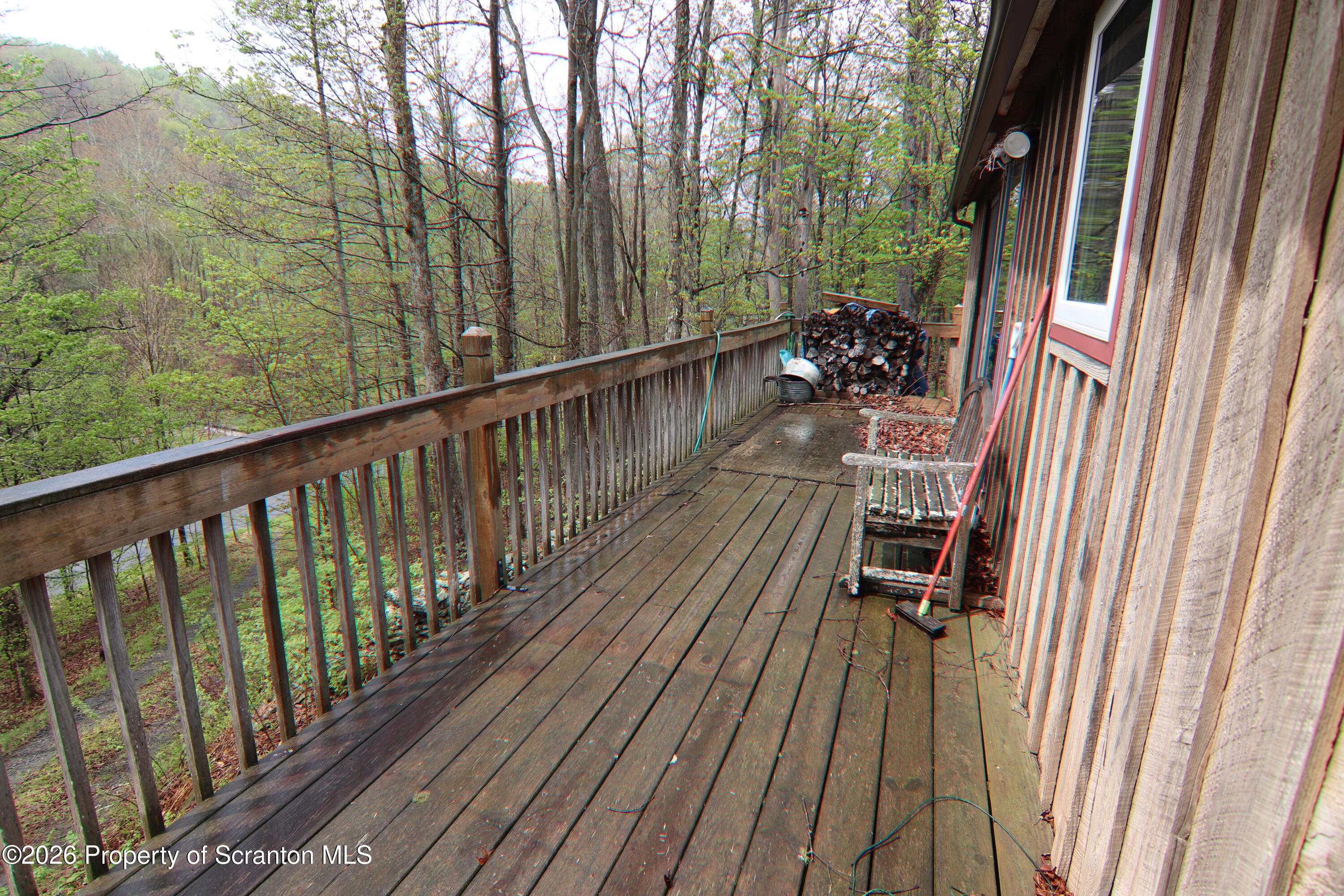 300 Pennsworth Hill Road Meshoppen, PA 18630 - Photo 32 of 38 a balcony with view of outdoor space