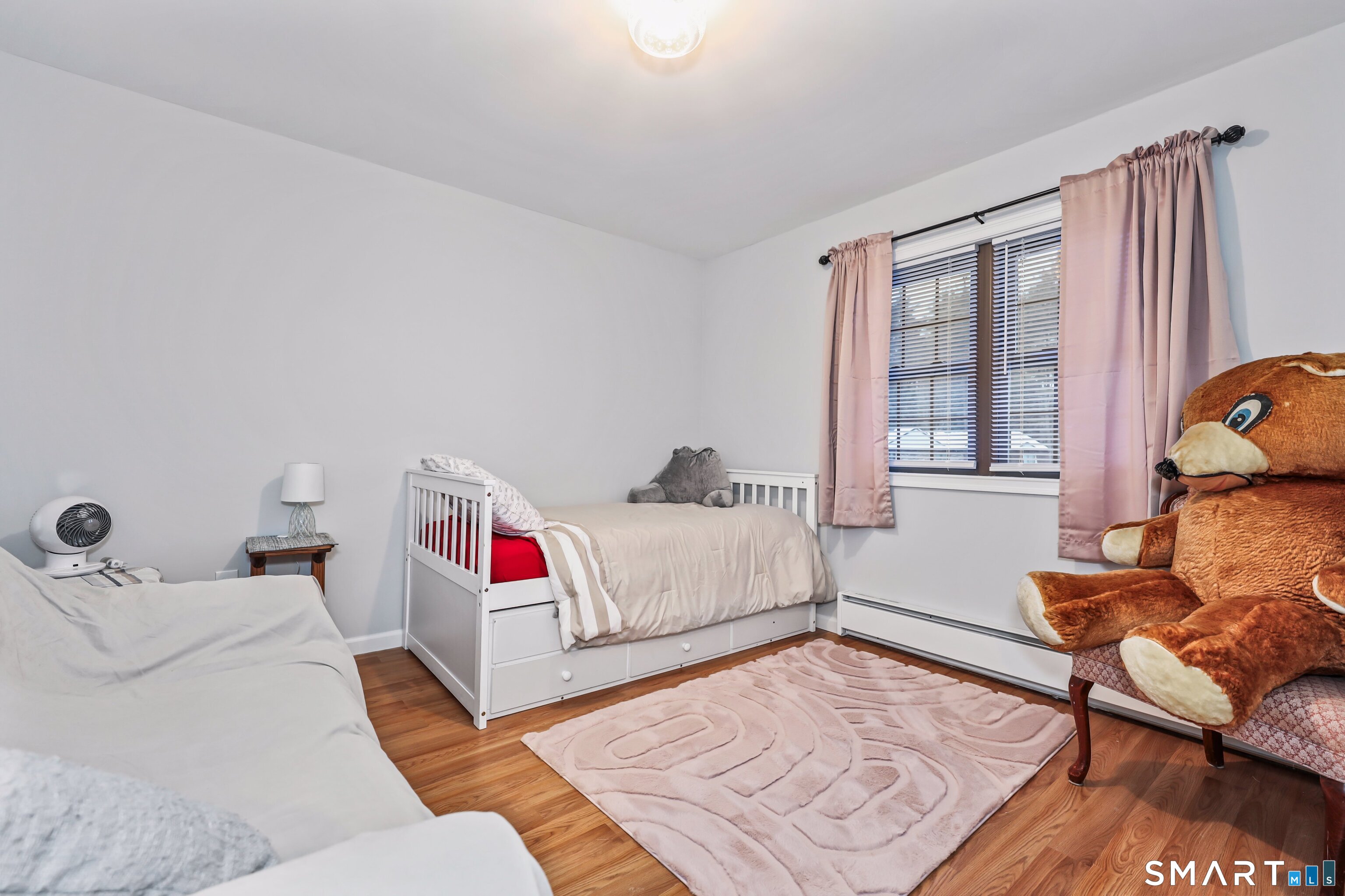 143 Pine Hill Road, Unit 5C Thomaston, CT 06787 - Photo 13 of 29 a bedroom with a bed and window