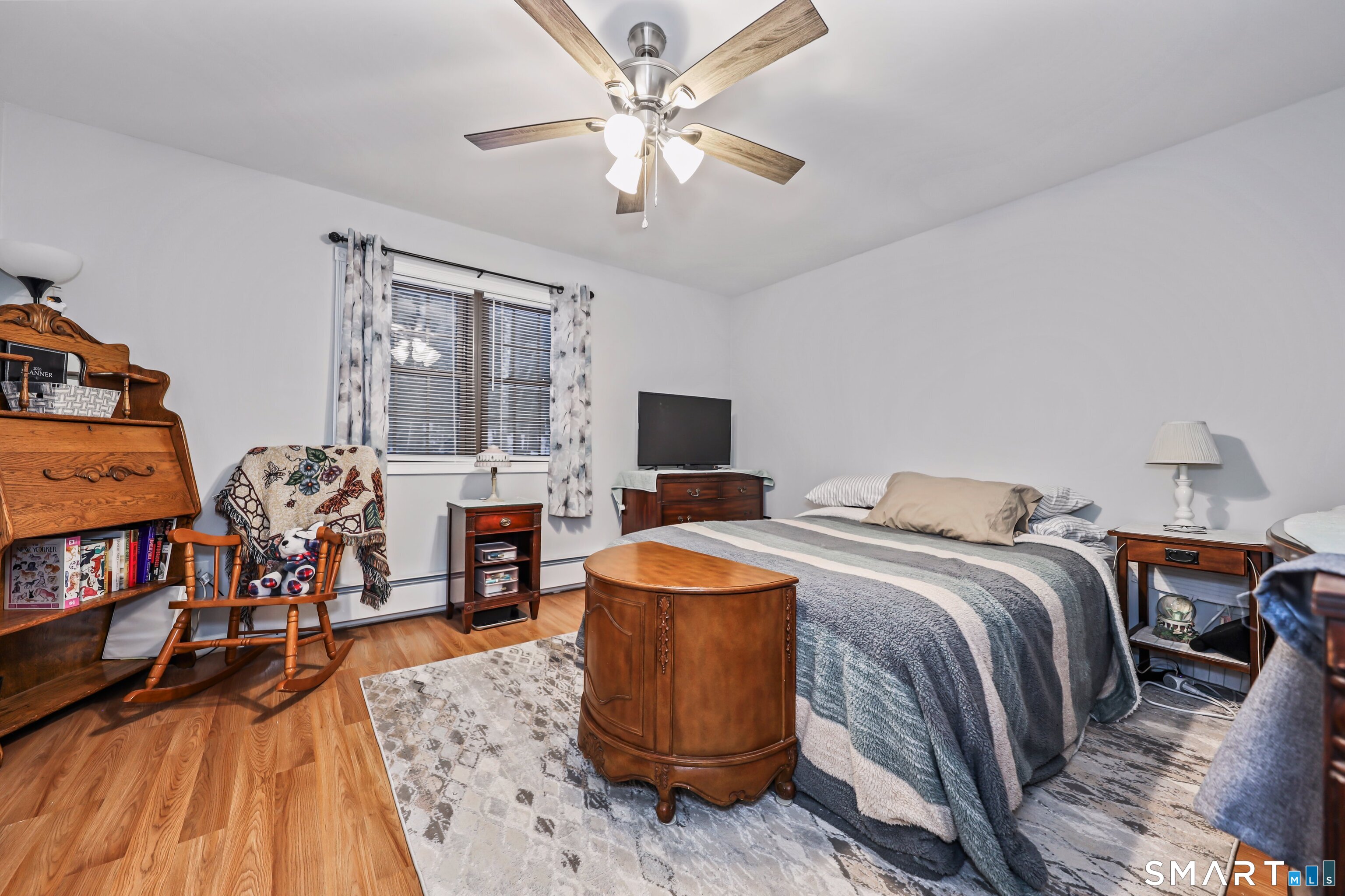 143 Pine Hill Road, Unit 5C Thomaston, CT 06787 - Photo 17 of 29 a bedroom with a bed and a flat screen tv