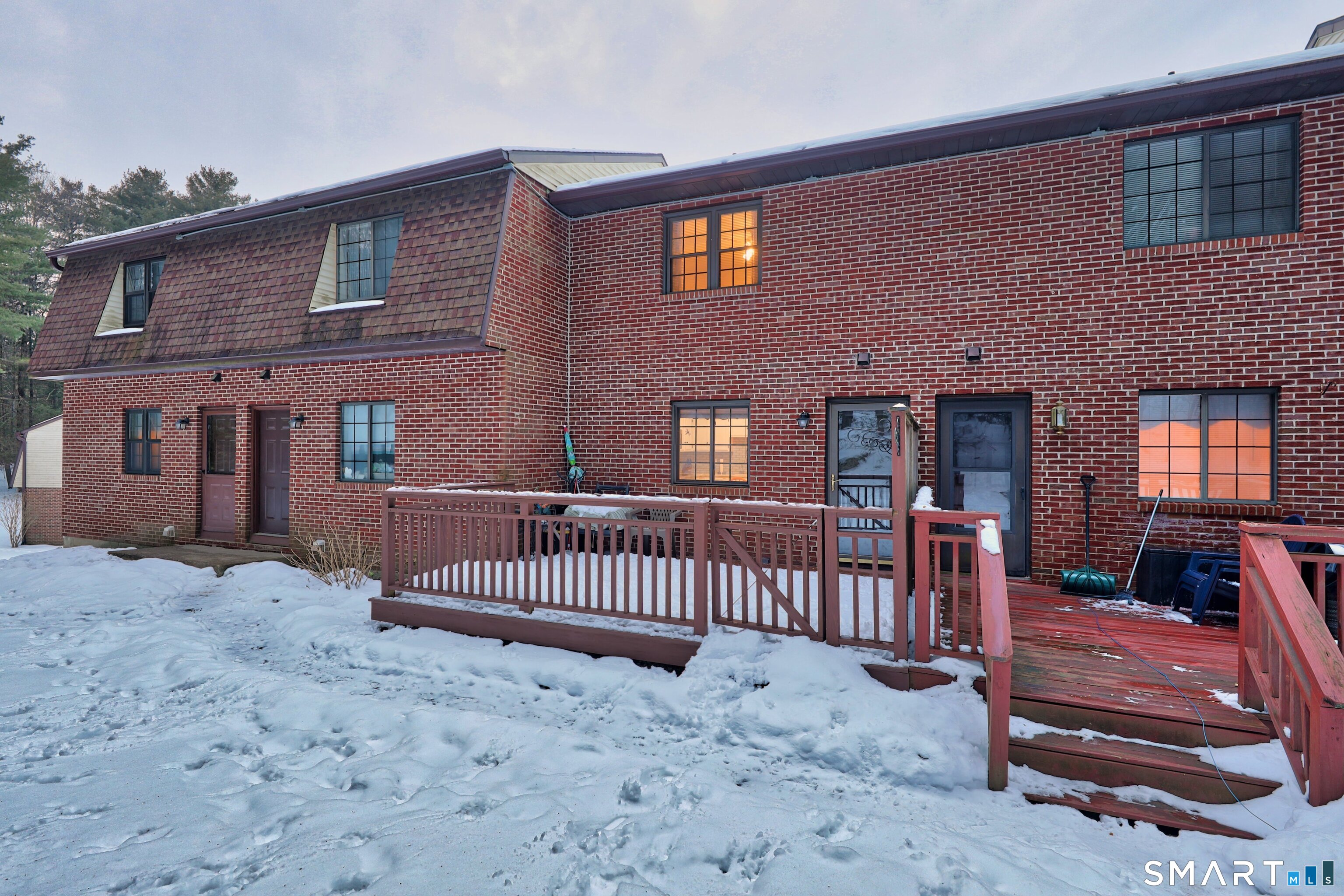 143 Pine Hill Road, Unit 5C Thomaston, CT 06787 - Photo 26 of 29 a front view of a house with a yard