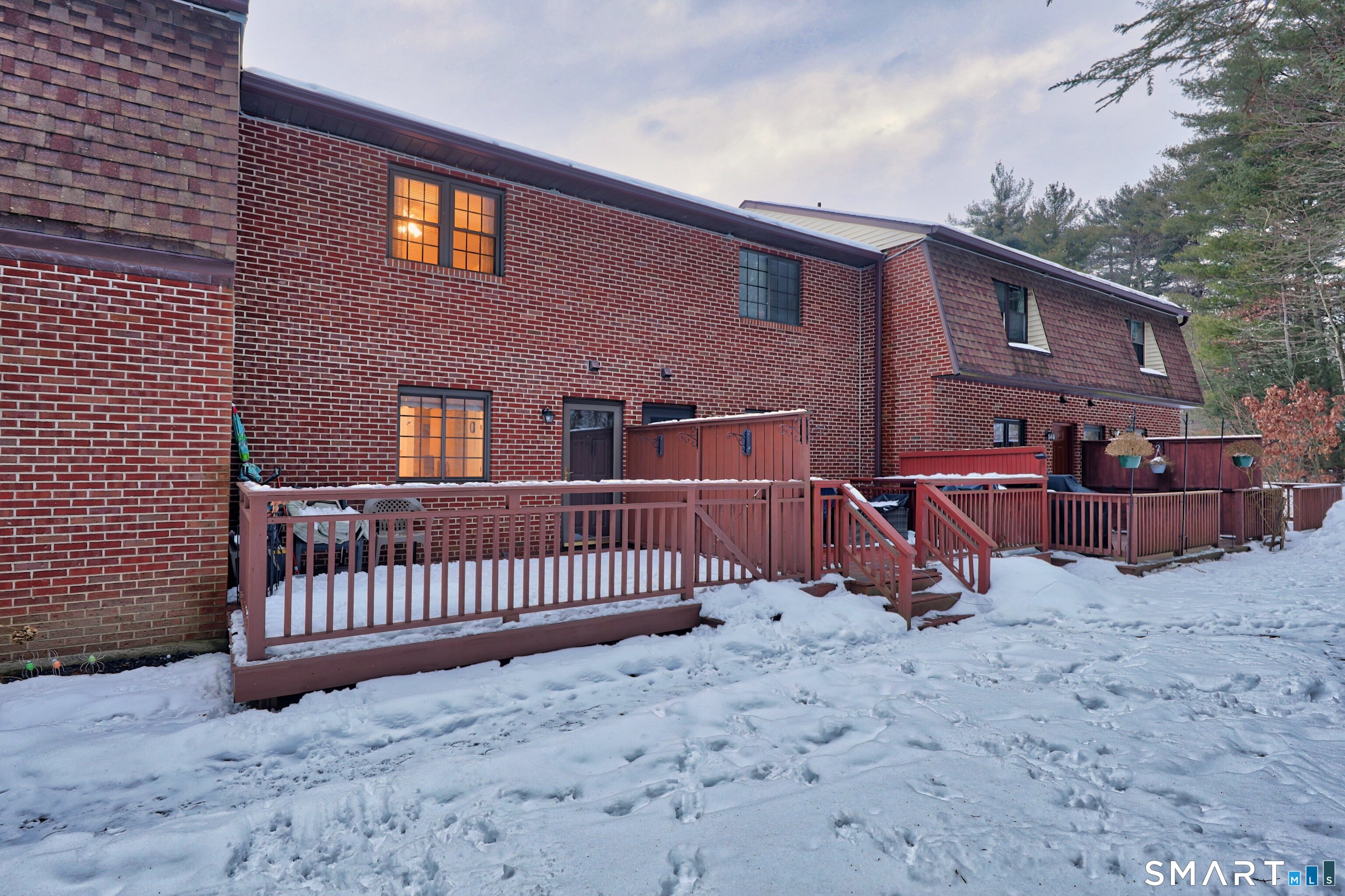 143 Pine Hill Road, Unit 5C Thomaston, CT 06787 - Photo 27 of 29 a view of a house with a yard and sitting area