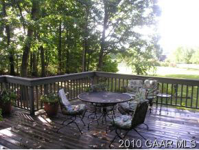 607 Augusta Farms Road Waynesboro, VA 22980 - Photo 4 of 12 a view of a wooden deck with furniture