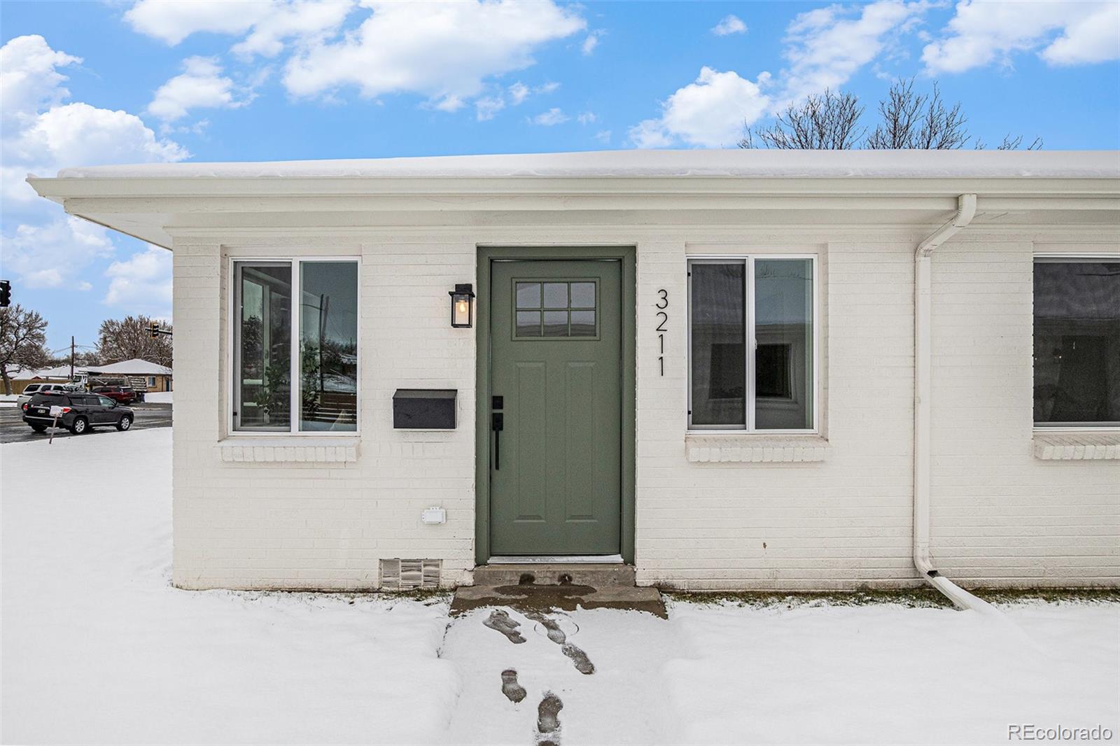 3211 Steele Street Denver, CO 80205 - Photo 21 of 26 a view of a house with a outdoor space