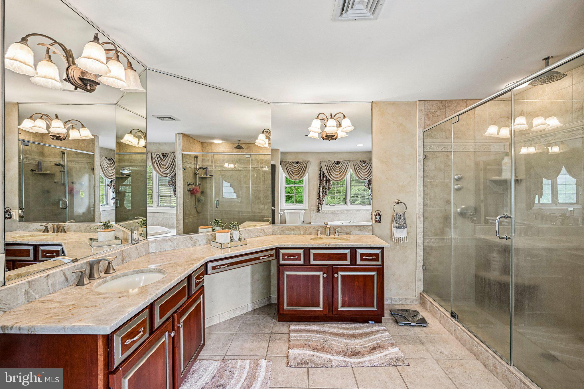 434 Meetinghouse Road Ambler, PA 19002 - Photo 25 of 51 a large bathroom with a double vanity sink and a mirror