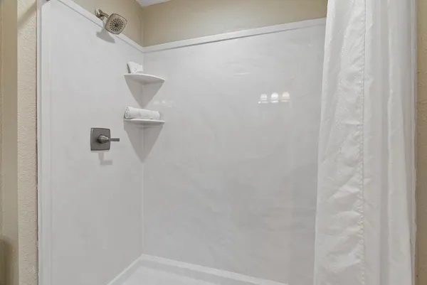 a view of a yard with swimming pool