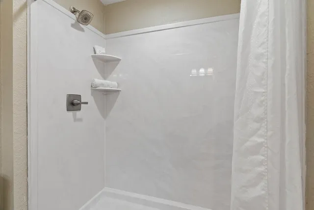 a view of a yard with swimming pool