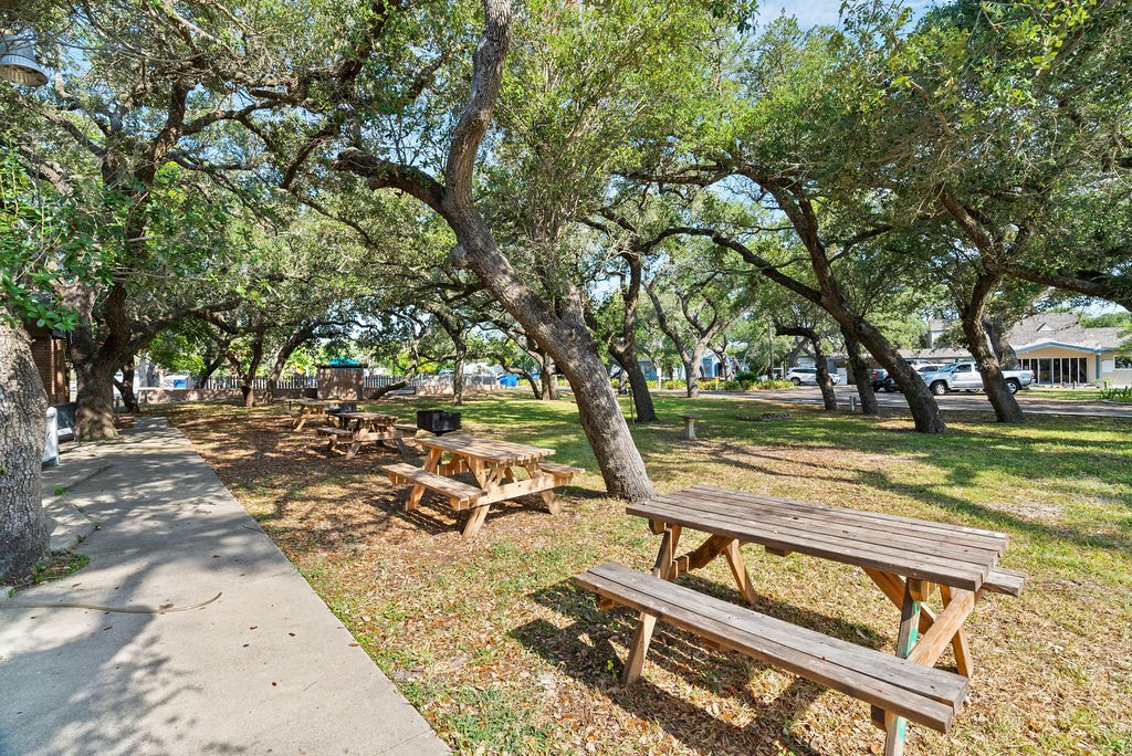 919 North Fulton Beach Road, Unit 324 Fulton, TX 78382 - Photo 15 of 21 a view of a yard with swimming pool