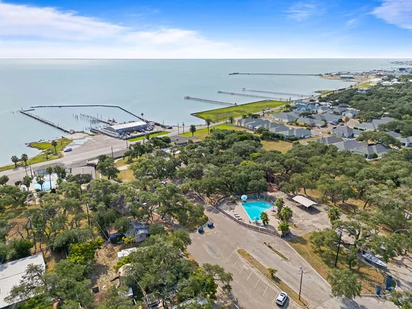 a view of a city with mountains in the background