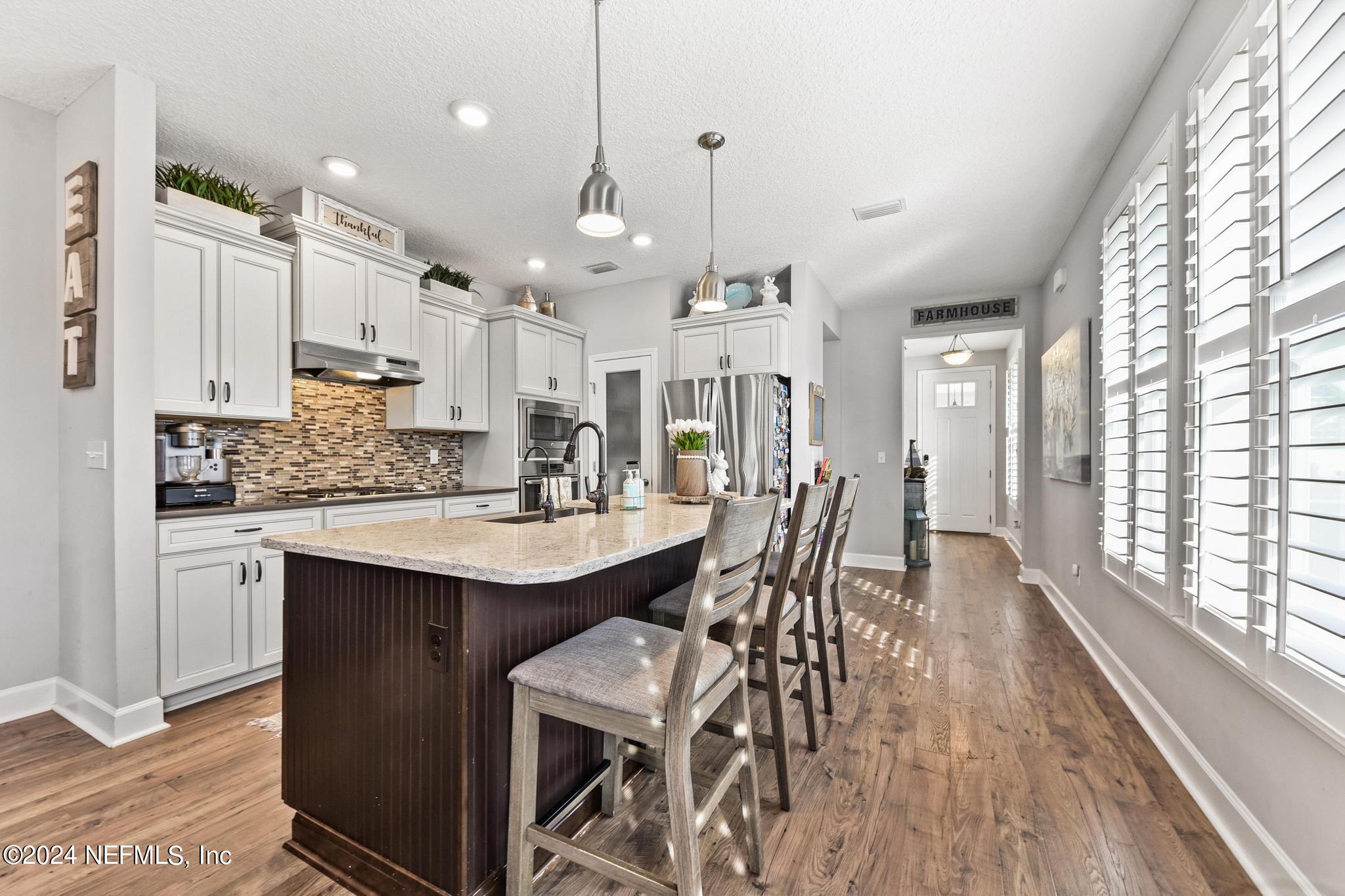 606 Stone Ridge Drive Ponte Vedra, FL 32081 - Photo 7 of 44 Kitchen from Family Room
