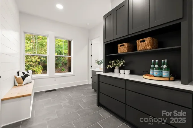 a view of a sink and a window
