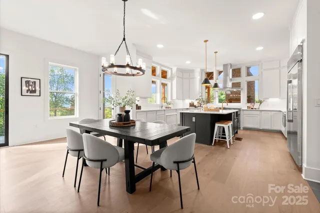 a view of a dining room with furniture window and outside view