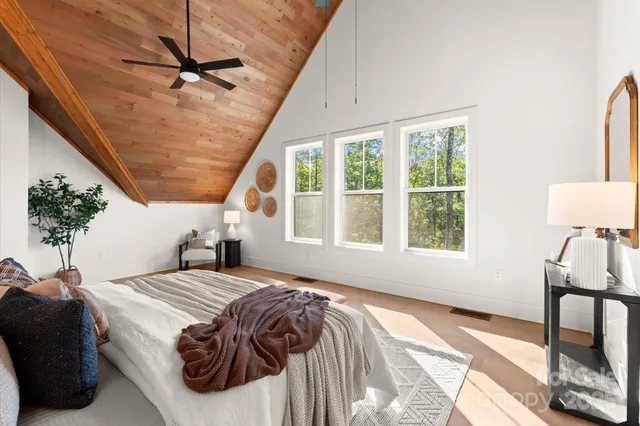 a bathroom with a sink a toilet and a shower