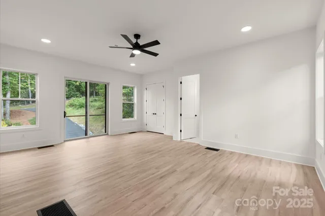 a front view of a house with a yard table and chairs