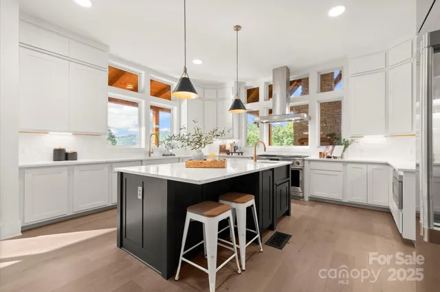 a kitchen with a sink counter top space and appliances