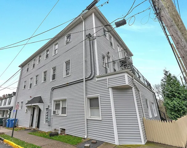 a view of a house with a garage