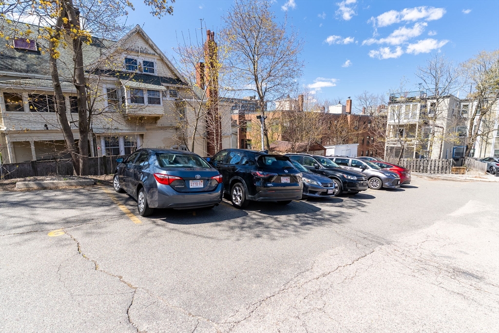321 Tappan Street, Unit 1 Brookline, MA 02445 - Photo 26 of 31 a car parked in front of a building