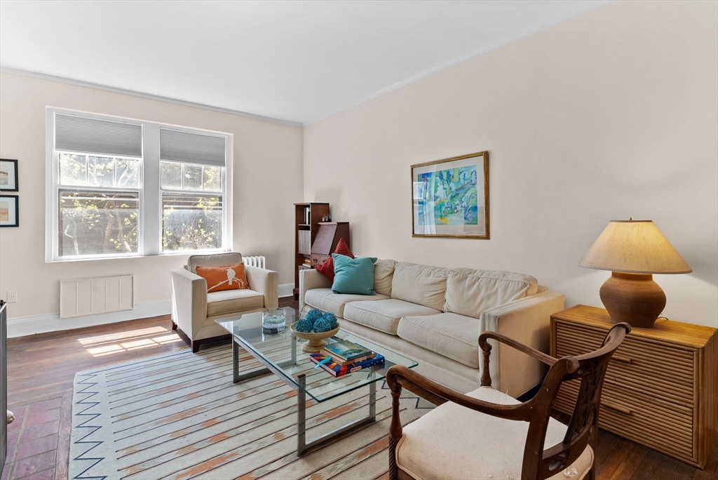 321 Tappan Street, Unit 1 Brookline, MA 02445 - Photo 4 of 31 a living room with furniture and a window