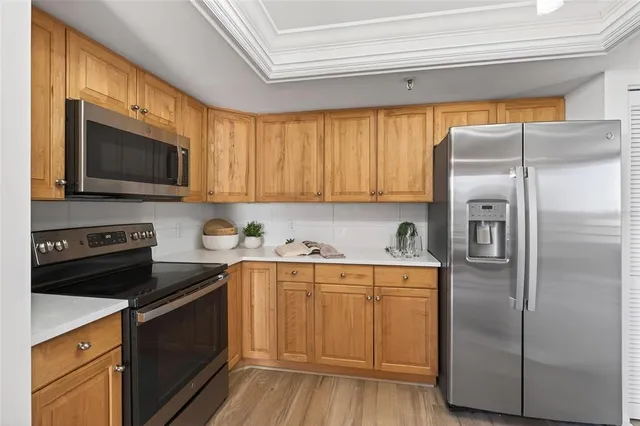 a bathroom with a toilet sink and a mirror