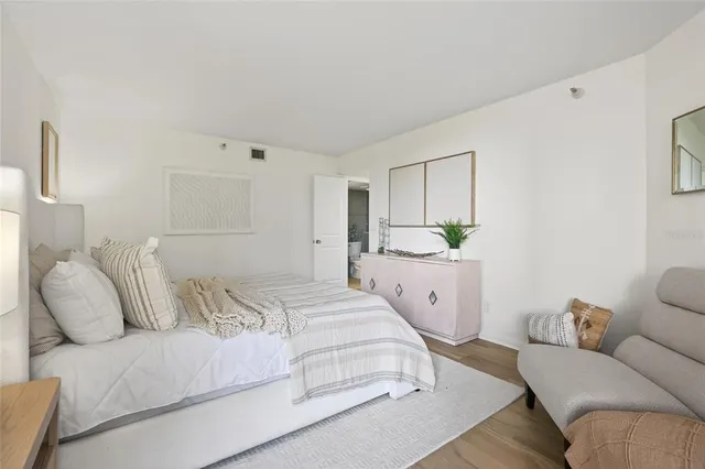 a view of a house with a yard and a fountain