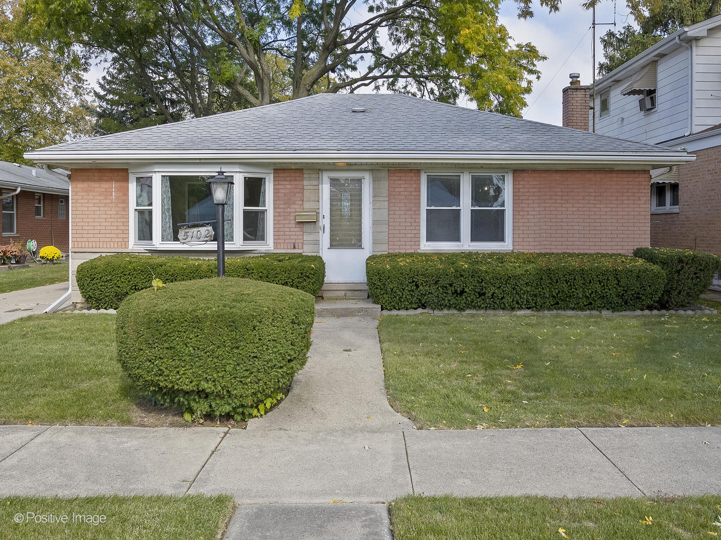 5102 Butterfield Road Hillside, IL 60162 - Photo 1 of 22 a front view of a house with a yard