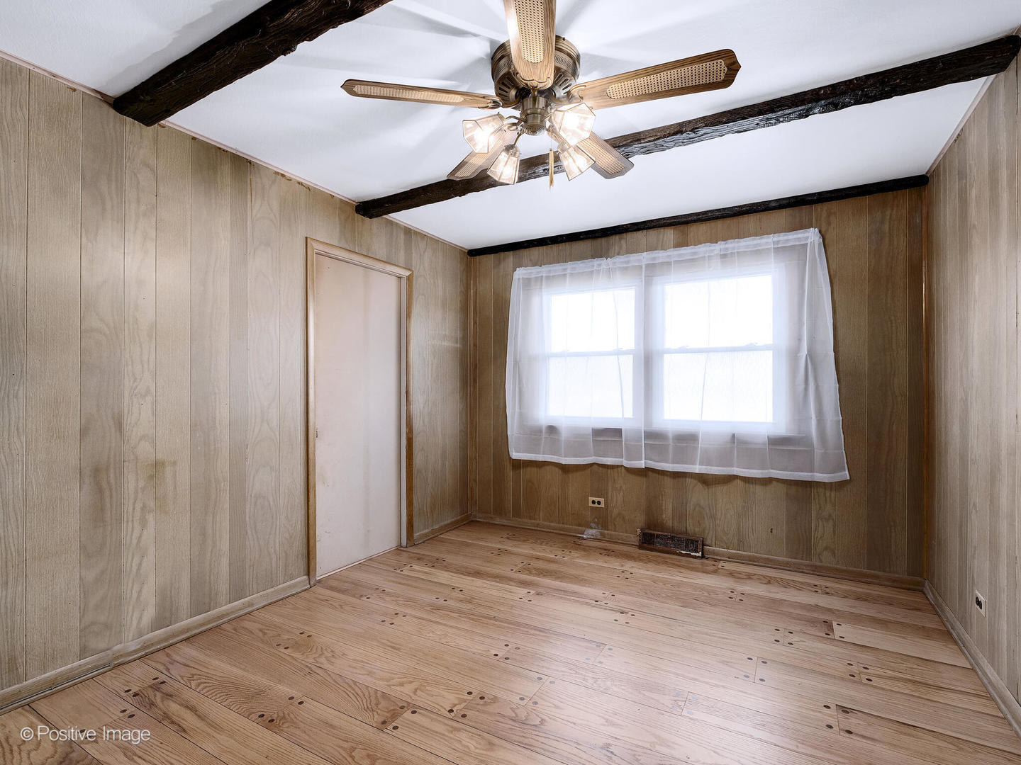 5102 Butterfield Road Hillside, IL 60162 - Photo 14 of 22 an empty room with windows and fan