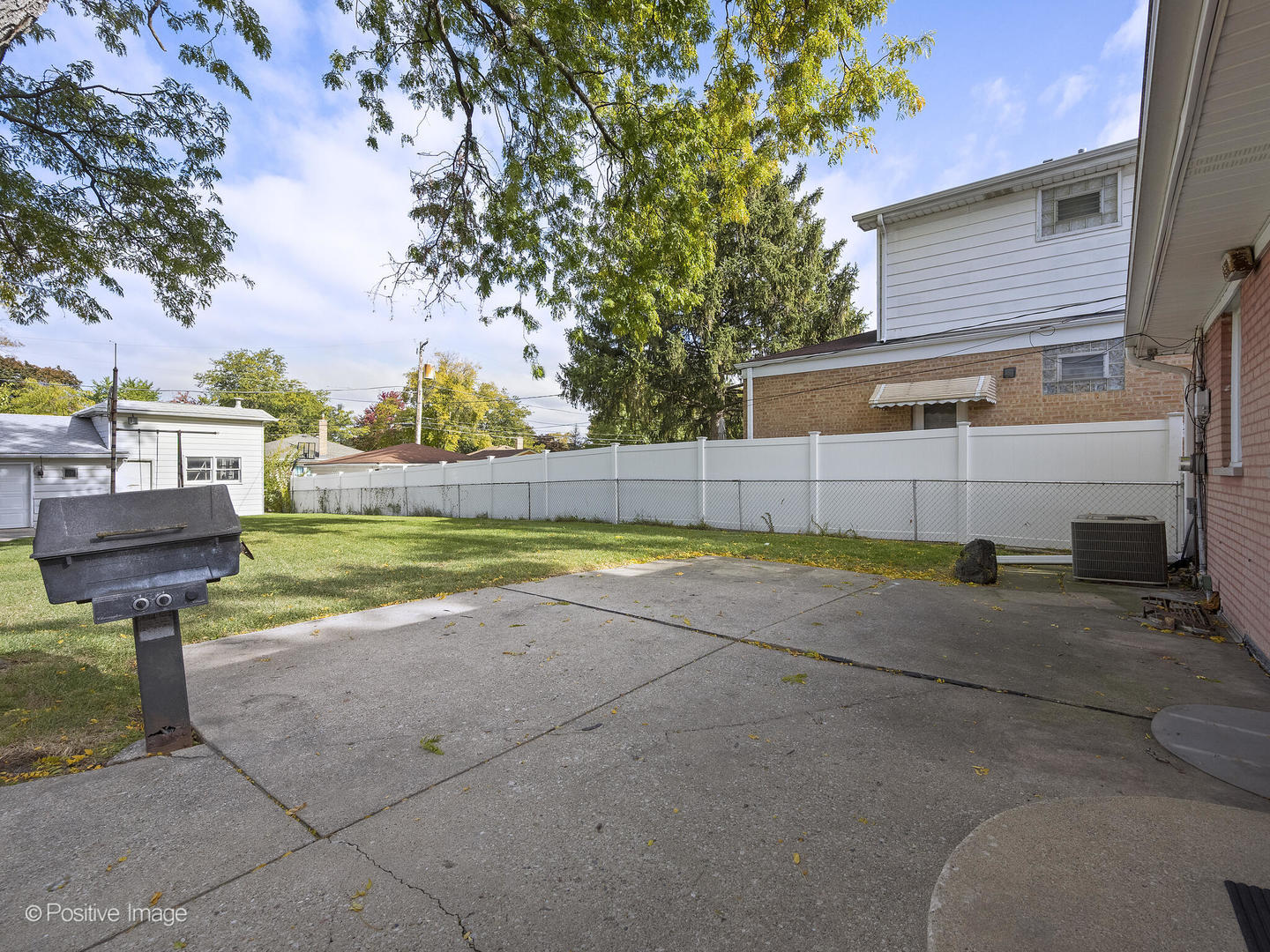 5102 Butterfield Road Hillside, IL 60162 - Photo 17 of 22 a view of a house with backyard and sitting area
