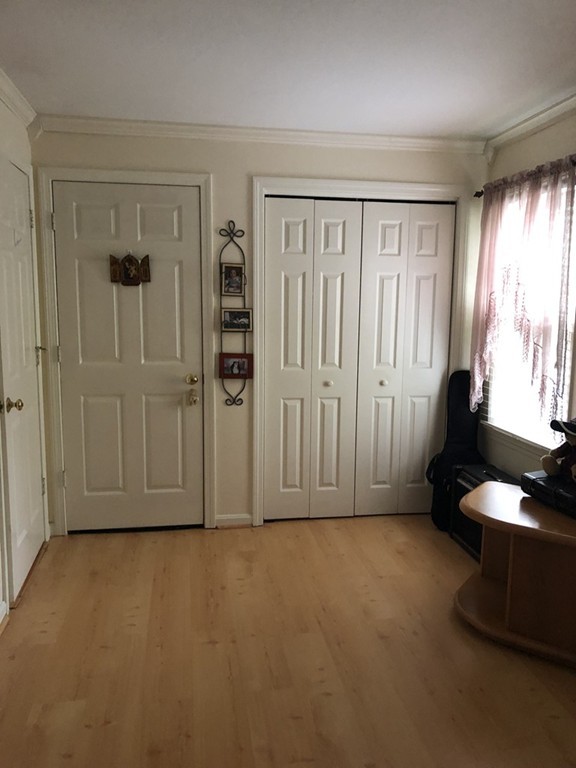 107 Center Depot Road, Unit F Charlton, MA 01507 - Photo 11 of 20 an empty room with windows