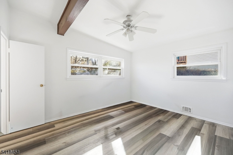 61 Hemlock Road Rockaway, NJ 07866 - Photo 15 of 40 a view of room with window and ceiling fan