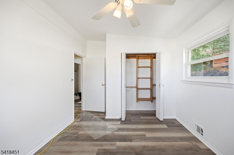 61 Hemlock Road Rockaway, NJ 07866 - Photo 21 of 40 an empty room with windows and closet