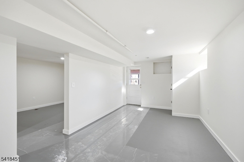 61 Hemlock Road Rockaway, NJ 07866 - Photo 25 of 40 an empty room with windows