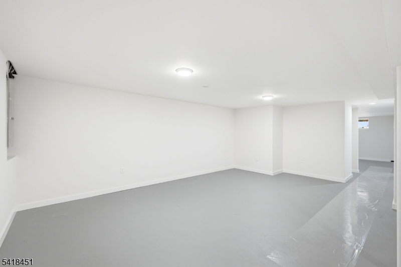 61 Hemlock Road Rockaway, NJ 07866 - Photo 30 of 40 an empty room with a natural light