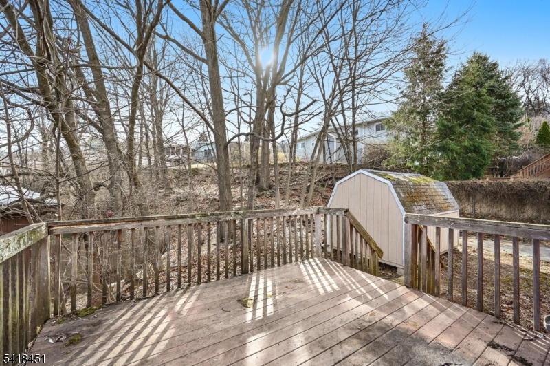 61 Hemlock Road Rockaway, NJ 07866 - Photo 33 of 40 a view of balcony with wooden floor and fence