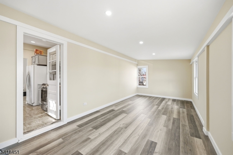 61 Hemlock Road Rockaway, NJ 07866 - Photo 9 of 40 a view of an empty room and glass door