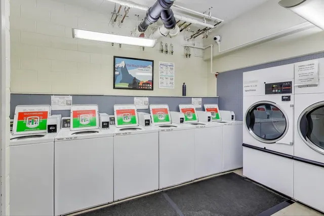 a utility room with lot of items washer and dryer