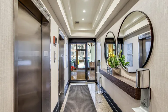 a view of entryway with a flower pot and a large window