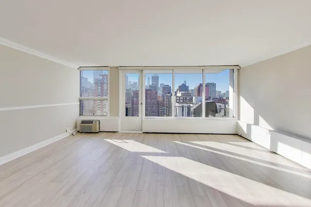 an empty room with windows