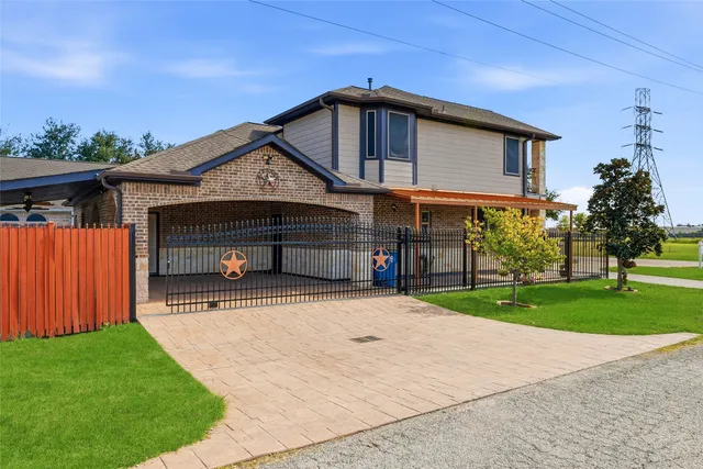 a bathroom with a granite countertop sink a mirror and bathtub