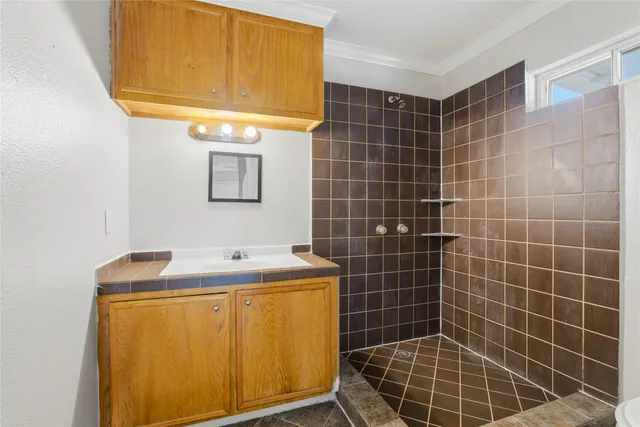 a kitchen with stainless steel appliances granite countertop a stove and a microwave