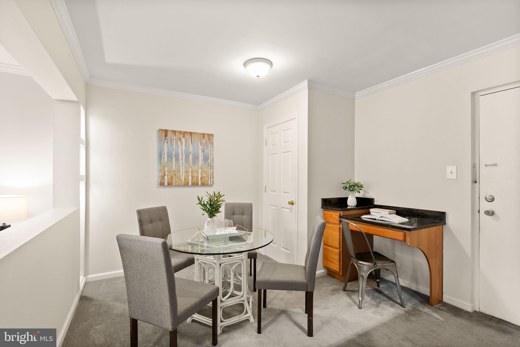 8511 Barrington Court, Unit S Springfield, VA 22152 - Photo 8 of 29 a dining room with furniture and window