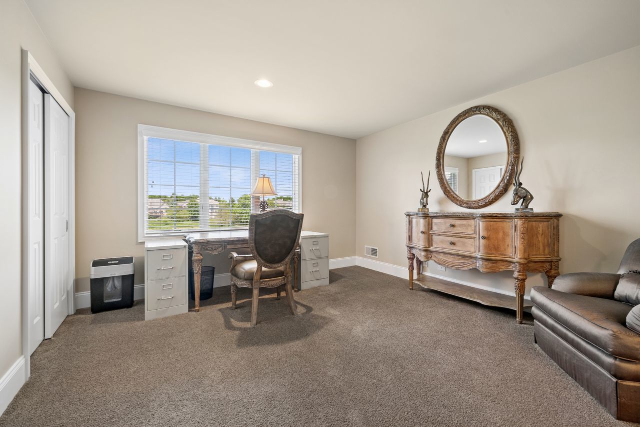 1029 Ridgeview Drive Inverness, IL 60010 - Photo 36 of 58 a living room with furniture a fireplace and a window