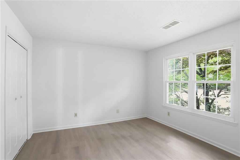 413 Promenade Court Marietta, GA 30064 - Photo 19 of 28 an empty room with windows