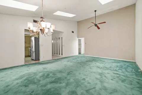 a view of a chandelier in a room