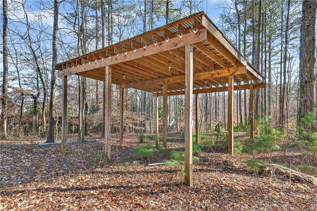 340 Scott Farm Drive Powder Springs, GA 30127 - Photo 54 of 59 a backyard of a house with lots of green space