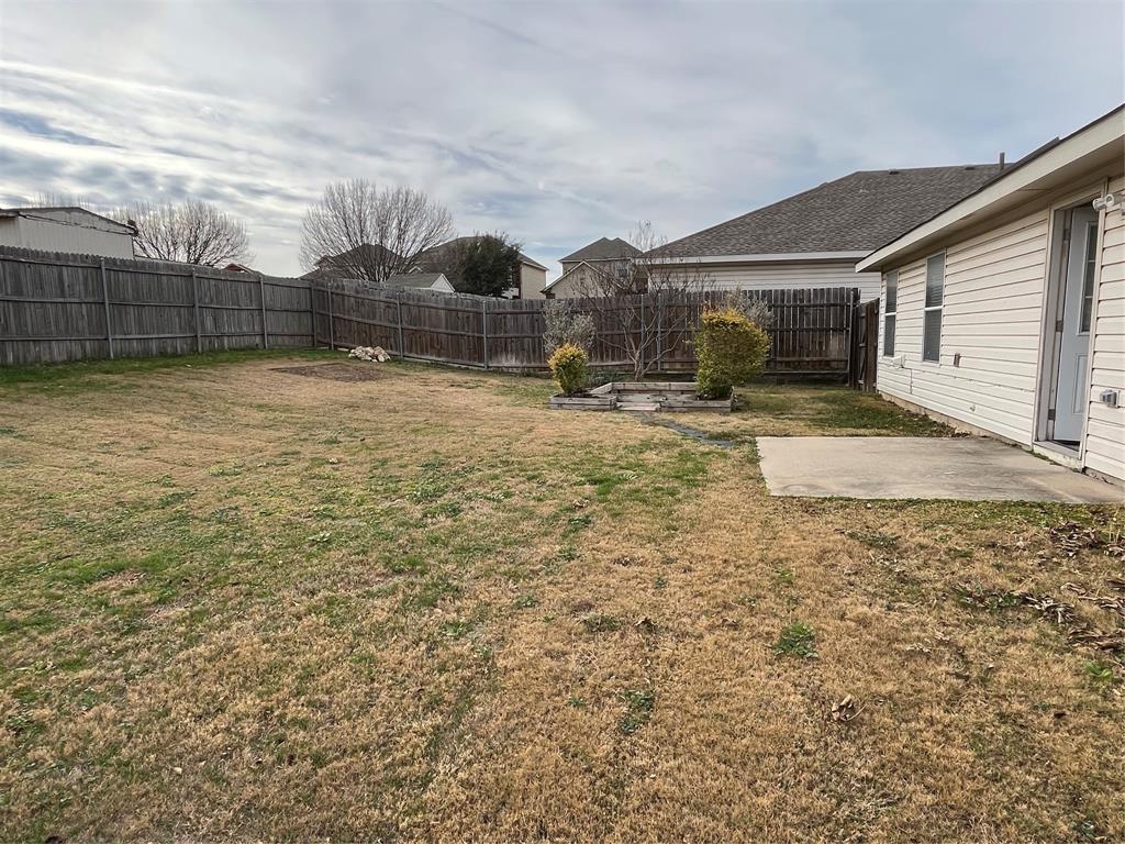849 Santa Rosa Drive Fort Worth, TX 76052 - Photo 14 of 16 a view of backyard of house