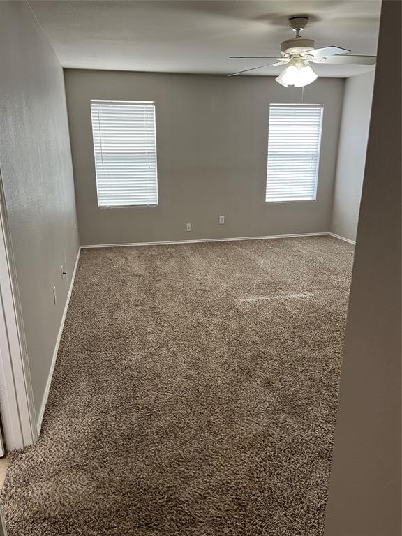 849 Santa Rosa Drive Fort Worth, TX 76052 - Photo 6 of 16 en empty room with a window