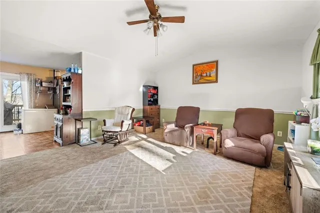 a living room with furniture and a couch