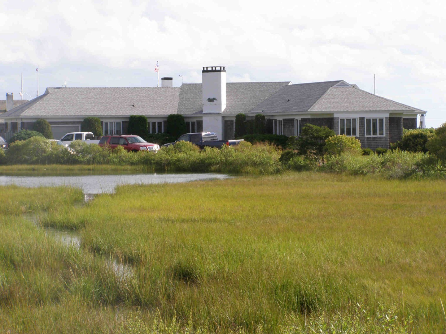 17 Dunham Road Edgartown, MA 02539 - Photo 1 of 2 a front view of a house with a yard