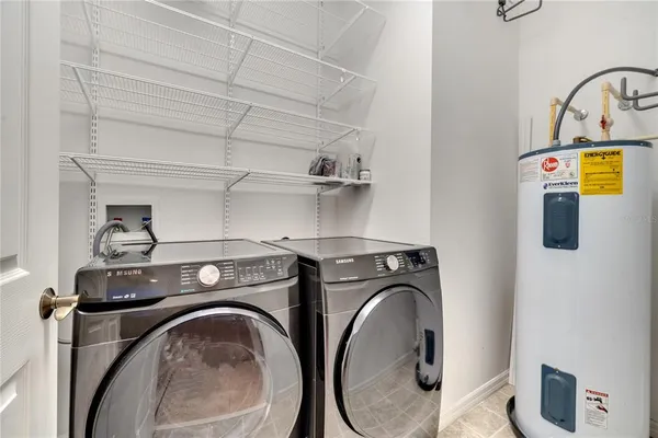 a utility room with dryer and washer