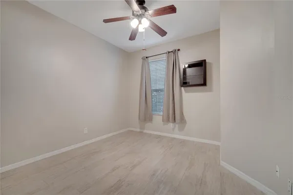 a view of a livingroom with a flat screen tv