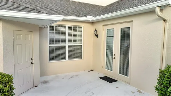 a view of a house with a porch